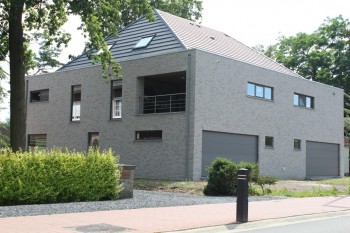 Bouwen van een bedrijfspand met woning en appartement